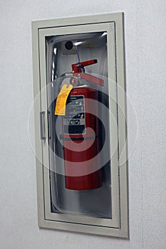 Fire extinguisher behind glass