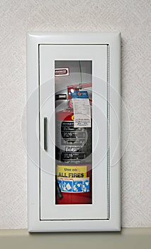 Fire extinguisher case in a wall.