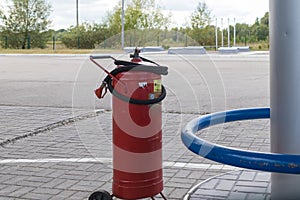 The fire extinguisher is charged and ready for use