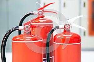 Fire extinguisher, Close-up red fire extinguishers tank in the building for fire equipment for extinguishing or protection and