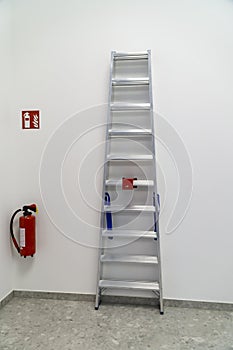 Fire extinguisher and ladder