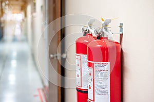 Fire extinguisher system on the wall background, powerful emergency equipment photo