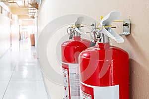 Fire extinguisher system on the wall background, powerful emergency equipment for industrial