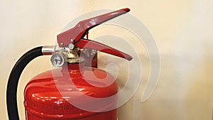 Fire extinguisher under preasure in daylight.