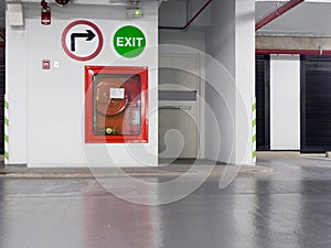 Fire extinguisher with various types of fire extinguishers Located in the fire escape door in the parking lot