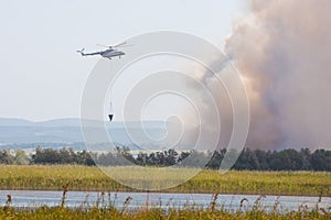 Fire extinguishing using helicopter MI8