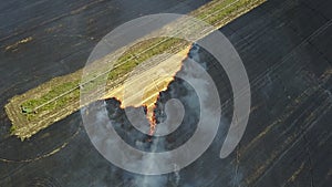 Fire in the field with stubble