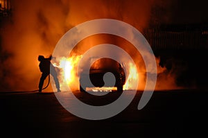 Fire Fighter in Car Blaze