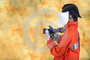 Fire fighter on fire background