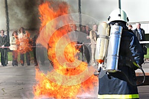 Fire fighter. Fire extinguishing photo