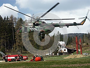 Fire-fighter and helicopter