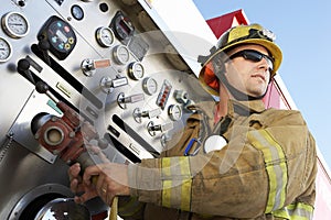 Fire Fighter Holding Hose