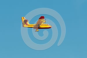 Fire fighting airplane flying