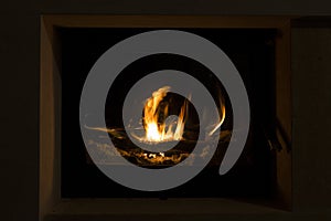 Fire in the Fireplace. Warm house.