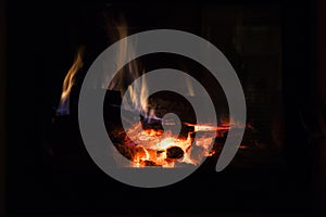 Fire in Fireplace. Warm house.