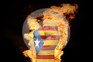 Fire fist with the national flag of catalonia