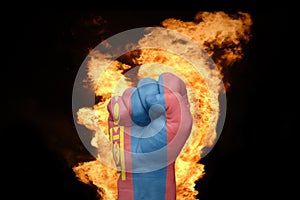 Fire fist with the national flag of mongolia