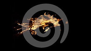 Fire flame isolated black isolated background Beautiful orange. Flame border . Sparks from campfire