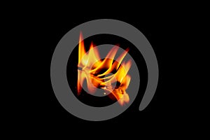 fire flame with reflection in the glass on a black background