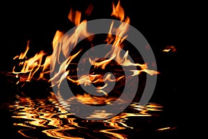 Fire flame water reflection bonfire