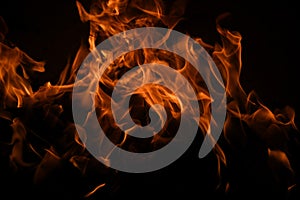 Fire flames on black background. Fire burn flame isolated, abstract texture. Flaming effect with burning fire.