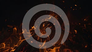 Fire Glowing Particles on Black Background