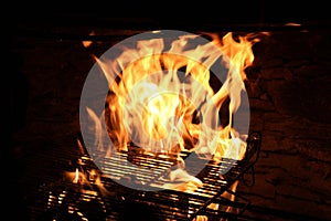 Fire in a grill photo