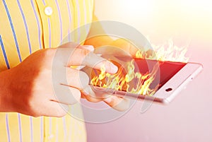 Fire hand hold fire smartphone .