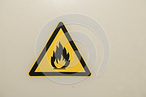 Fire hazard sign on a gray background