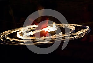 Fire hoop dancer