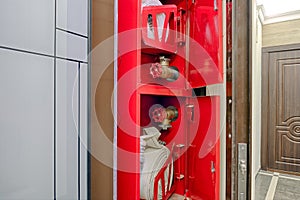 Fire hose reel in a residence building area