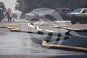 Fire hoses stretching