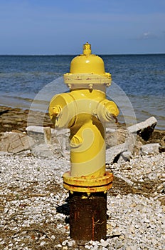 Fire hydrant near ocean shore photo