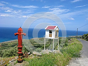 Fire hydrant near road to the sea