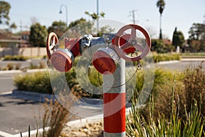 Fire hydrant in red and grey colour