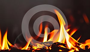 Fire lights on a black background. Fireballs in the night. A burning fire or fire. Danger from fire. The work of a fakir