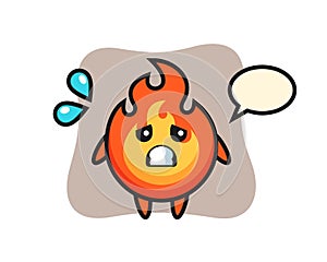 Fire mascot character with afraid gesture