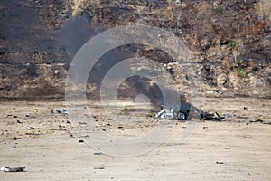 fire and movement of car part blown away from car bomb investigation training course