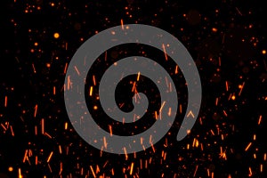 Fire particles isolated on black background overlay. Put it over your image in screen mode