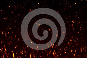 Fire particles isolated on black background overlay. Put it over your image in screen mode