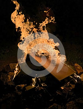 fire pit with a dresser on fire with detail of flames and fire texture