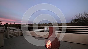 Fire Place On Deck Of Residential Home A Sunset In Arizona