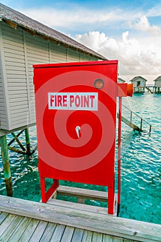 Fire point sign at Beautiful water villas in tropical Maldives i