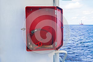 Fire prevention onboard vessel at sea. Fire cabinet with fire equipment