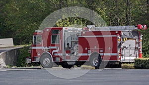 Fire pumper truck at intersection photo