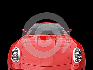 Fire red urban sports car - headlights and hood closeup