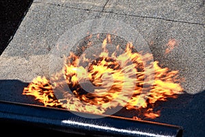 Fire on roofing material