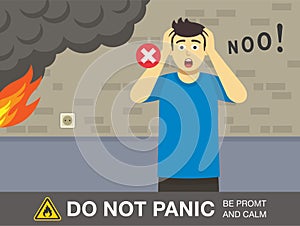 Fire safety activity. Scared young man is yelling no and holding his head with hands. Do not panic, be promt and calm warning desi