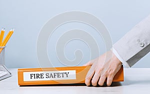 Fire safety labor protection. Folder with documents or instructions
