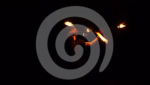 Fire show. Fire worker juggles